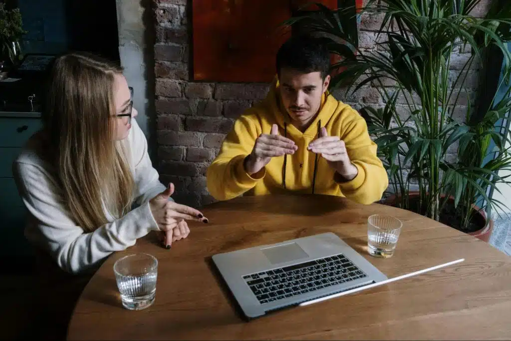 A man and woman having a serious conversation