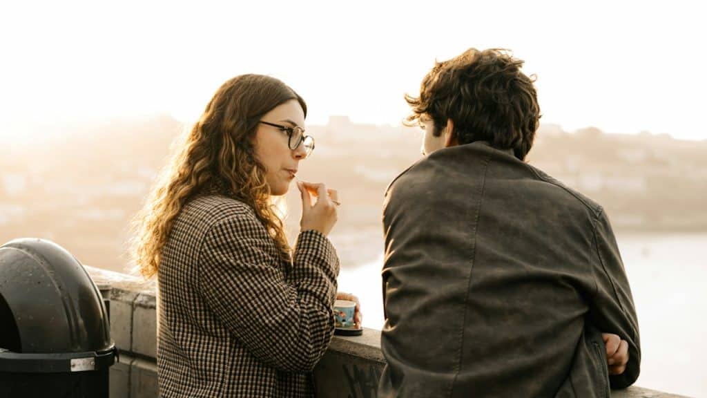 A man and a woman standing next to each other