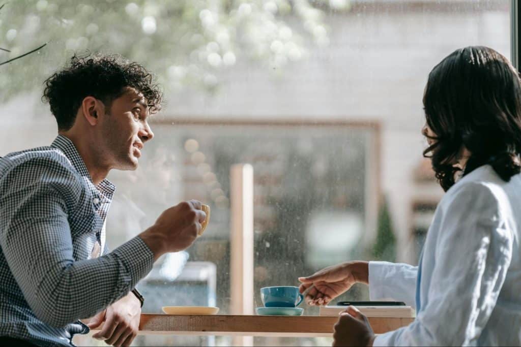 A man and woman having a coffee 