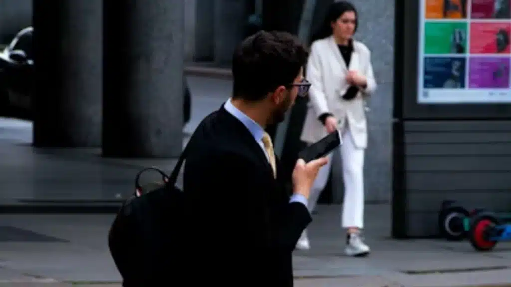 Man arriving on time to meet his partner outdoors