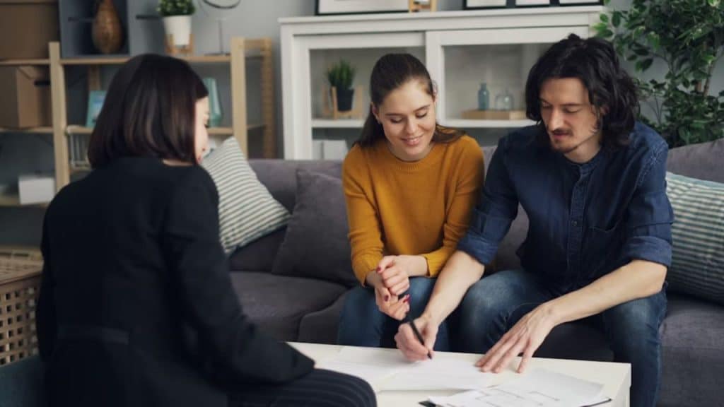 Couple reviewing a financial plan with a financial advisor