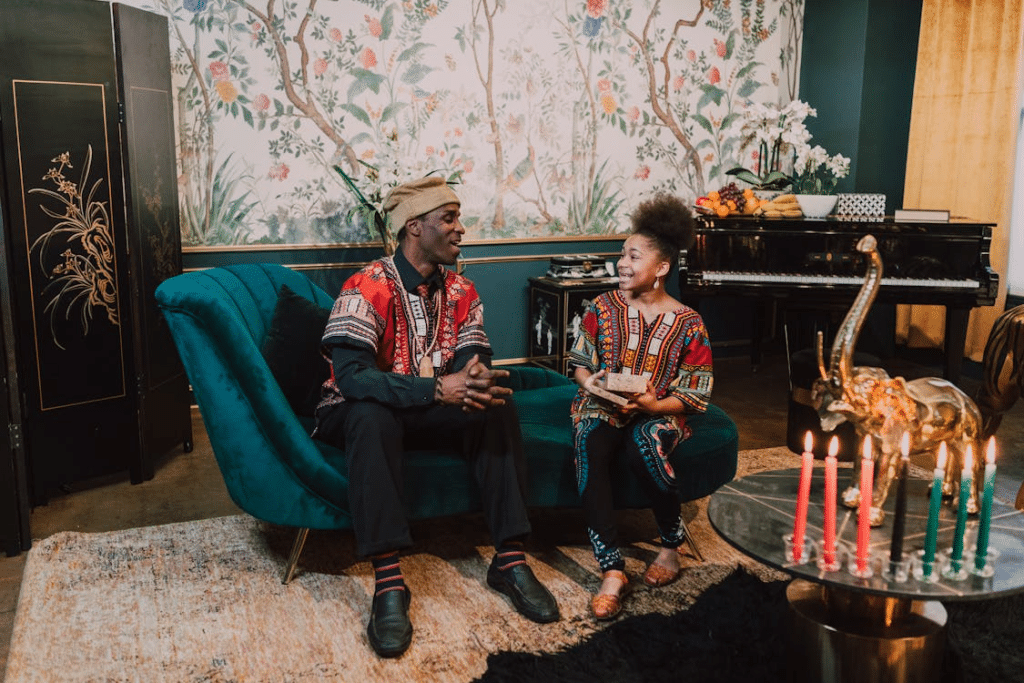 Man And Woman Having A Conversation While Sitting On A Couch
