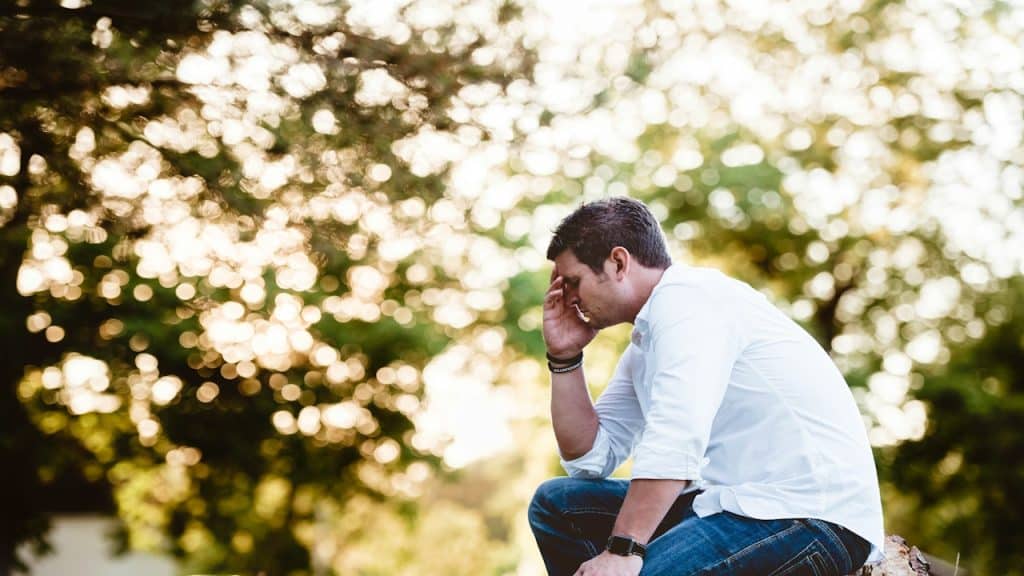 Man sitting in a thinking pose