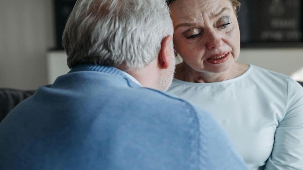 A man listening to his upset wife