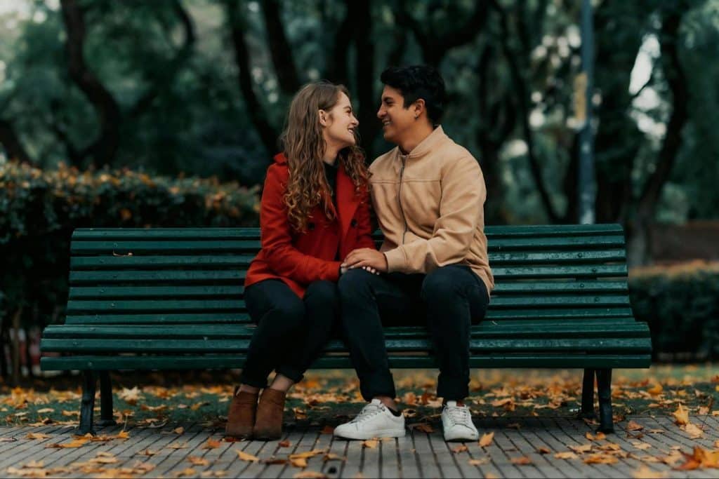A man and woman holding hands