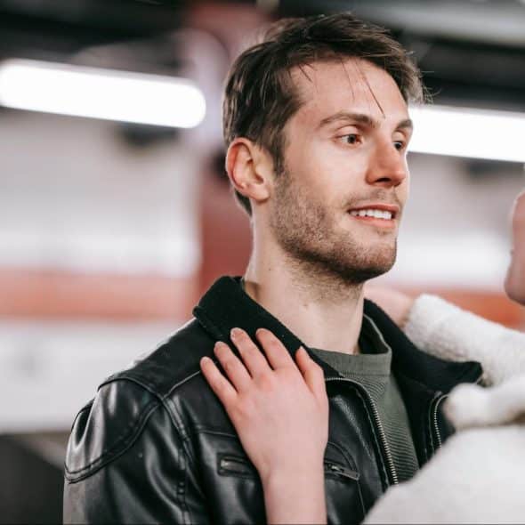 A man looking at the woman