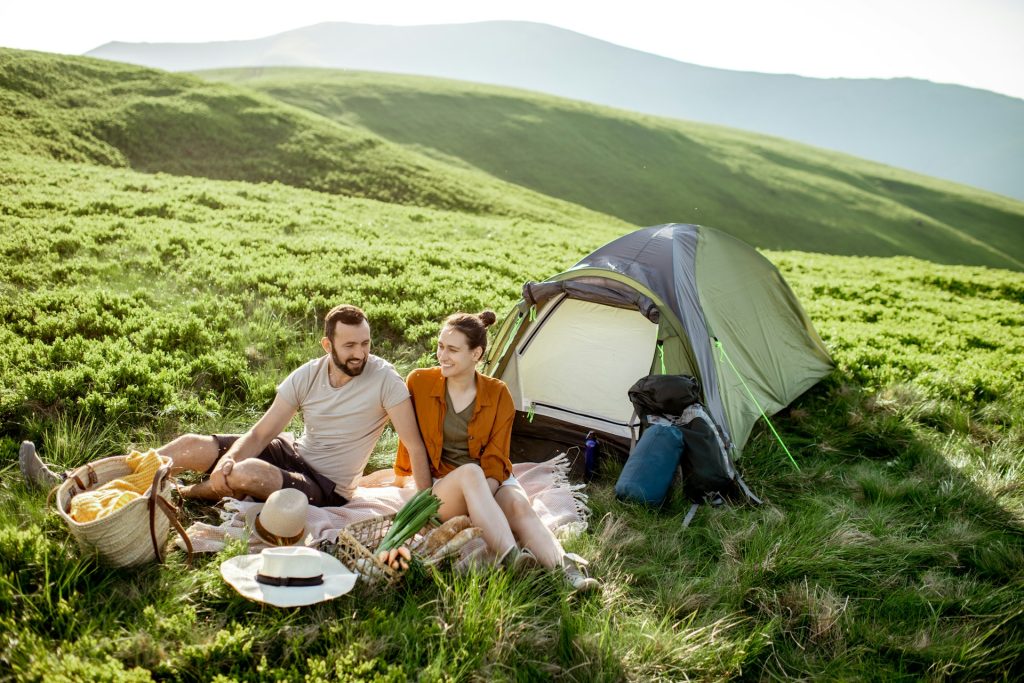 The couple is on a camping trip.
