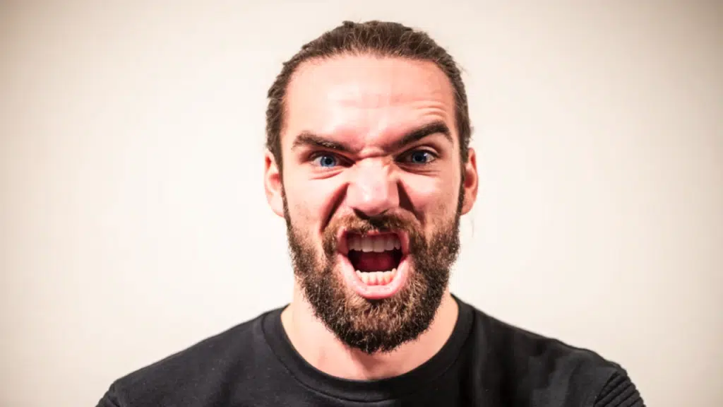 A man yelling into the camera