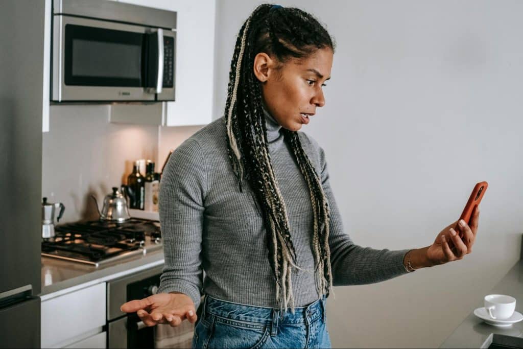 A woman talking someone in the phone