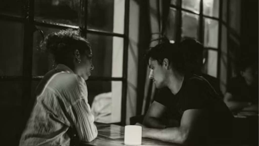 Couple experiencing monotony and lack of connection during dinner