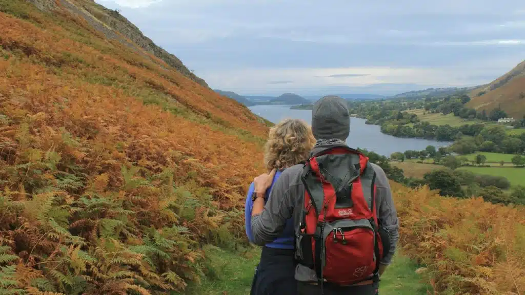 An old couple enjoying a beautiful view.
