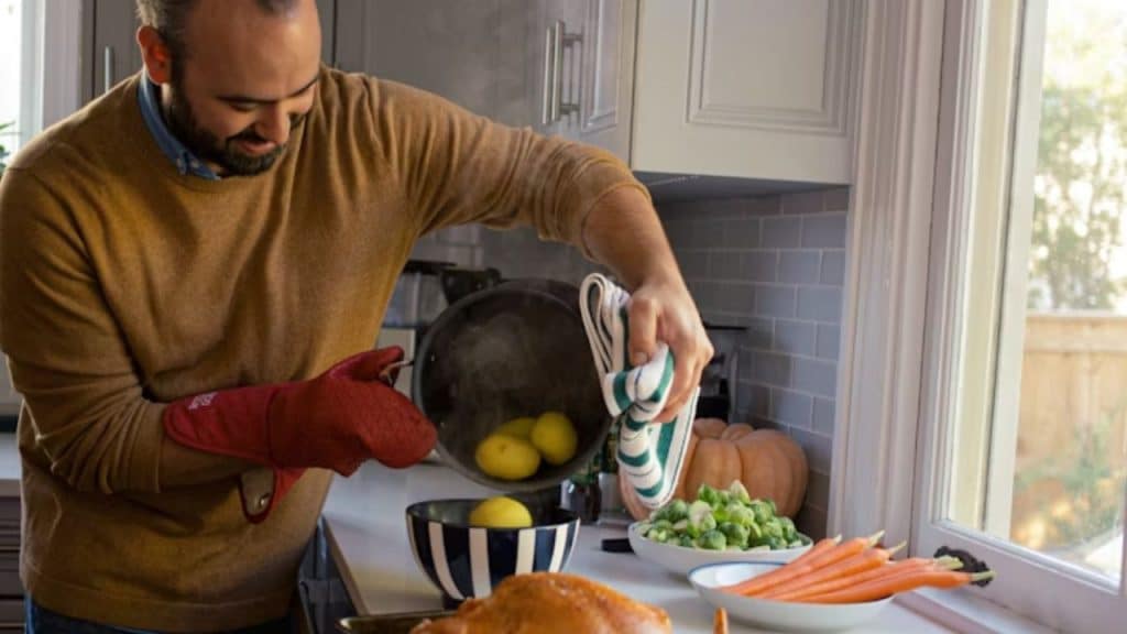 Man preparing a healthy meal in a modern kitchen