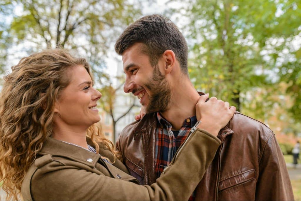 A man and woman talking