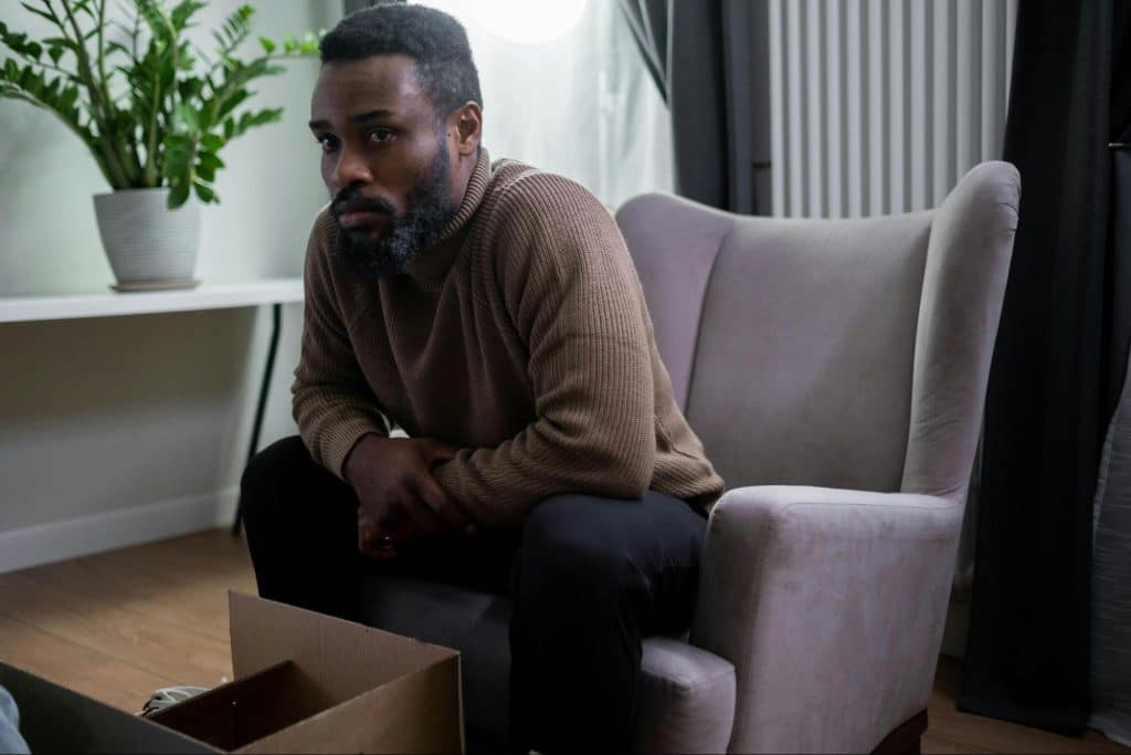 A man sitting on the couch