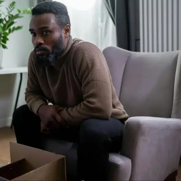 A man sitting on the couch