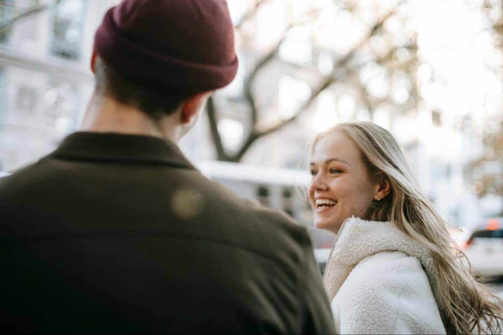 A man looking at the woman