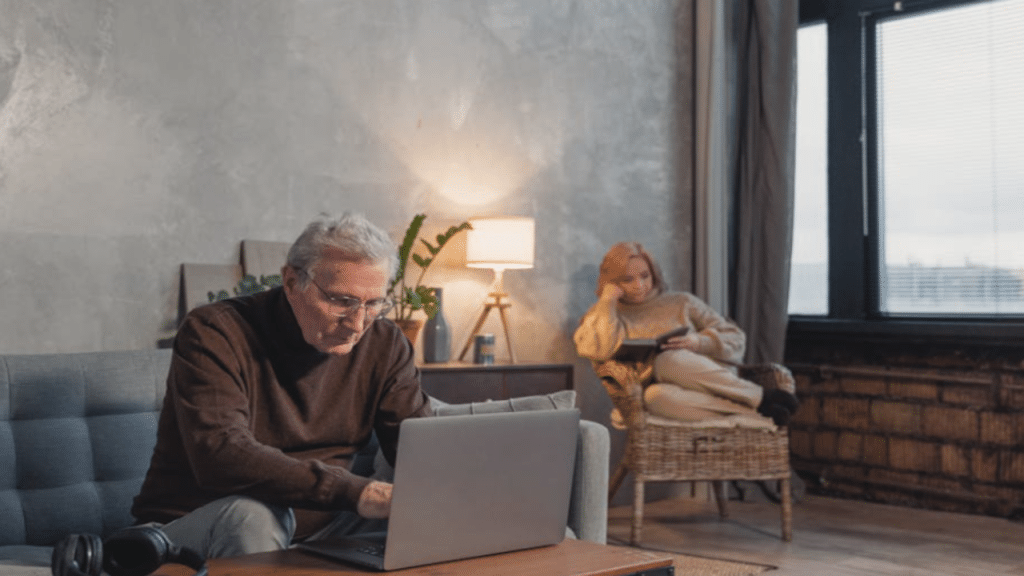A couple ignoring each other at home