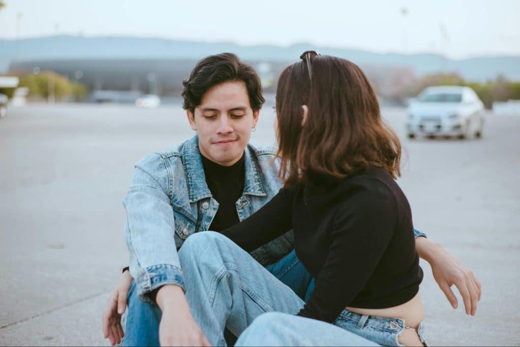 A man and woman sitting