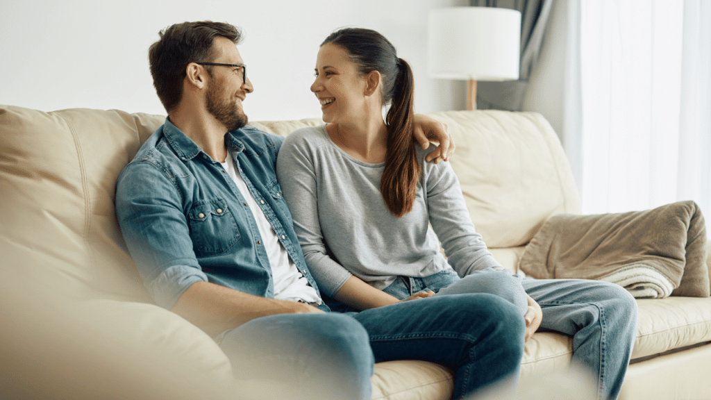 A couple relaxing in the living room