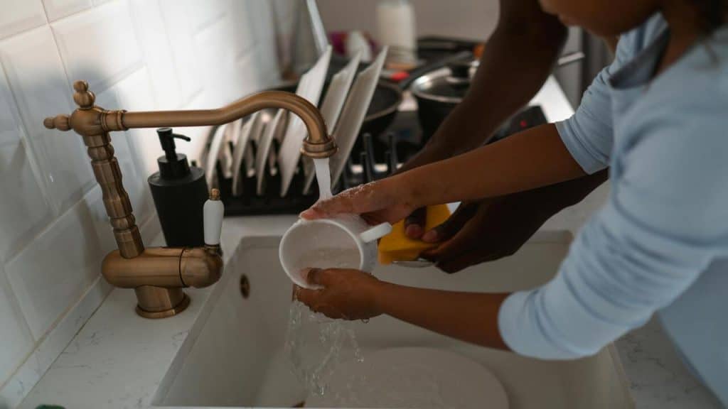 A couple doing the dishes together