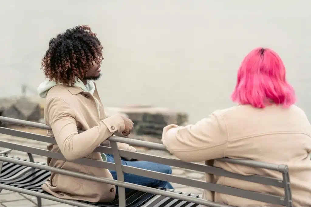 A man telling a story to a woman