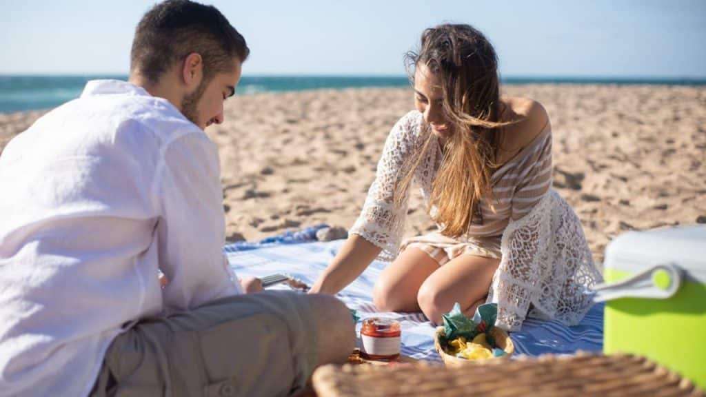 A couple enjoying a picnic outdoors