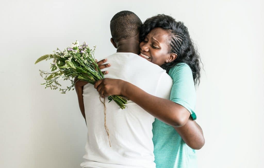 The wife received a bouquet from her husband.