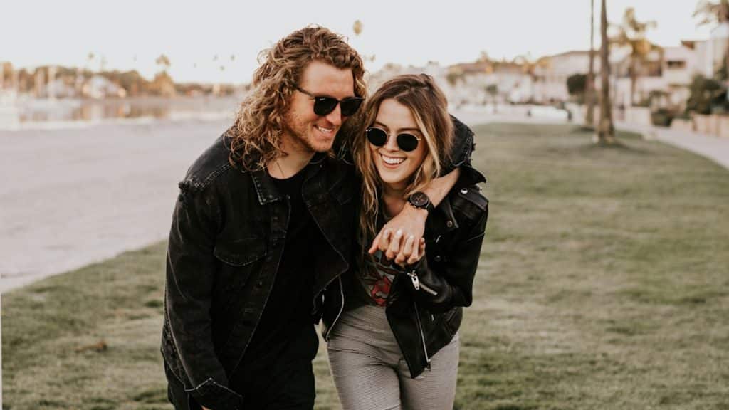 A happy couple walking together.