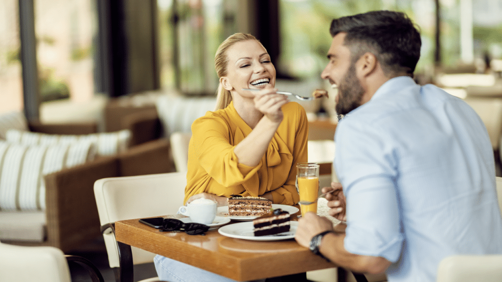 A woman feeding her husband