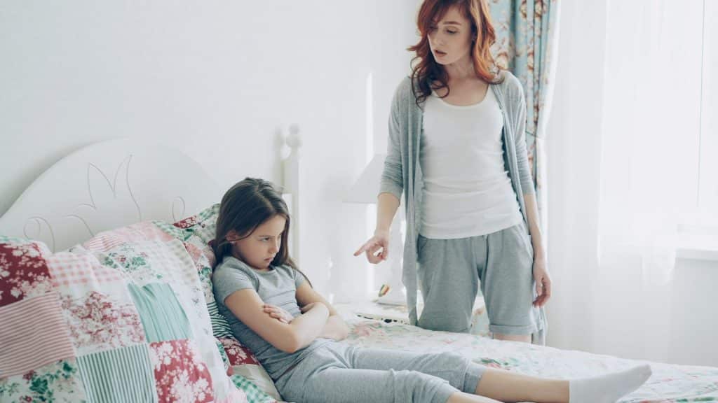 The mother is scolding her daughter.