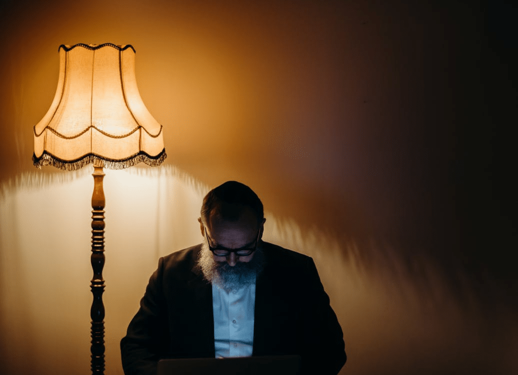 Photo Of Man Beside Lamp
