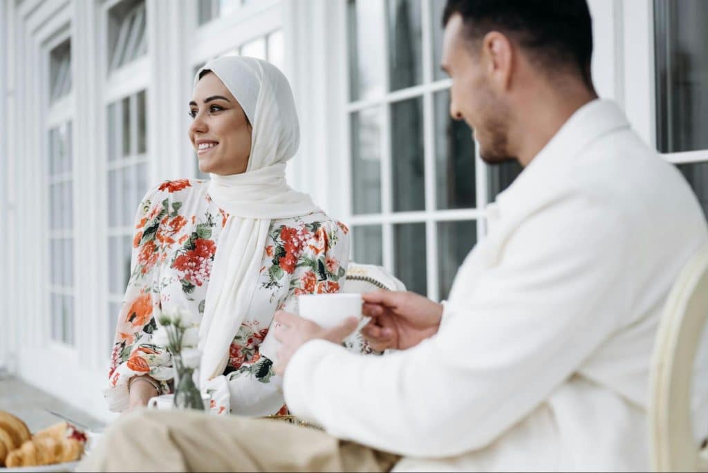 A man and woman having a coffee