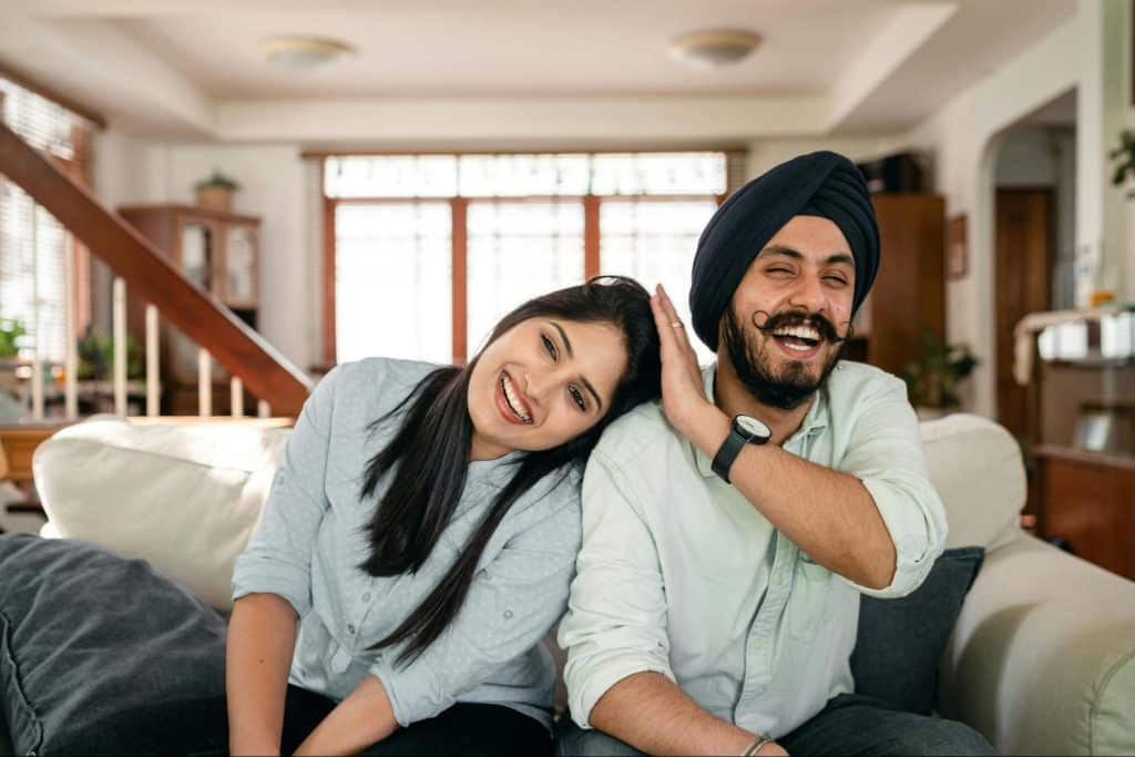 A man and woman laughing together