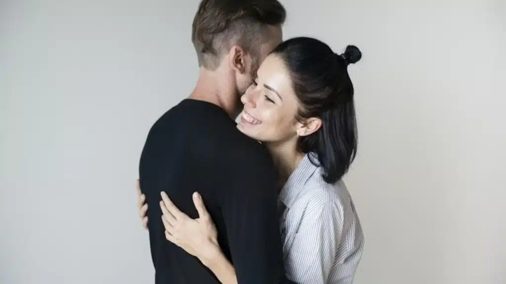 Couple embracing warmly after a heartfelt talk