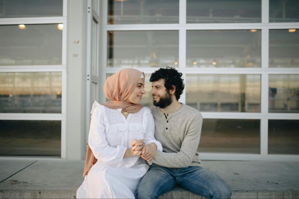 A man and woman looking at each other