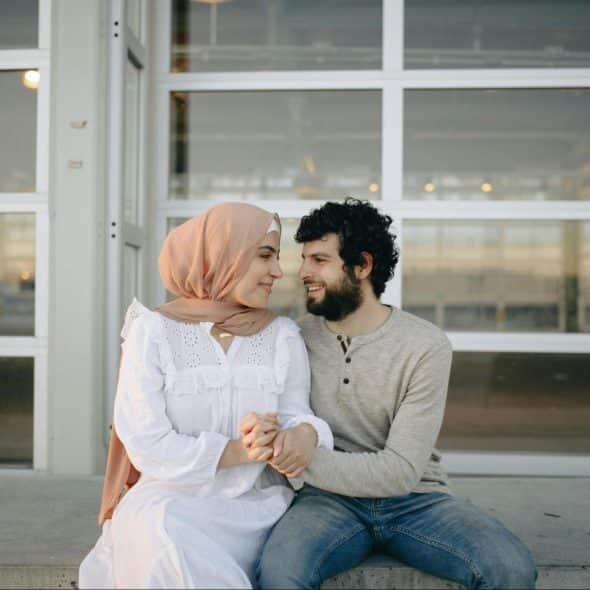 A man and woman looking at each other