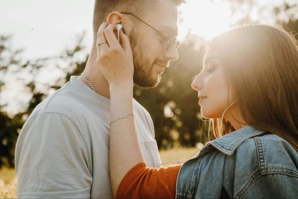 A man and woman facing each other
