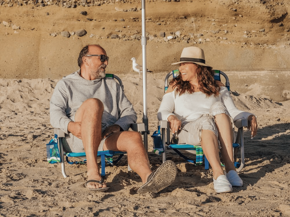 Photo of an Elderly Couple at the Beach