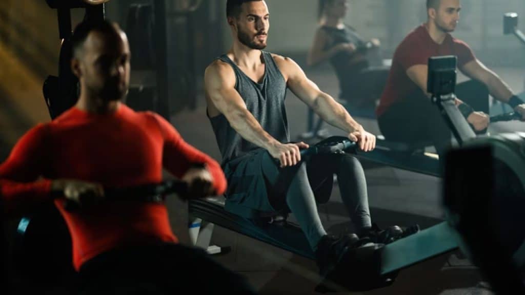 Group of men exercising together in a gym class