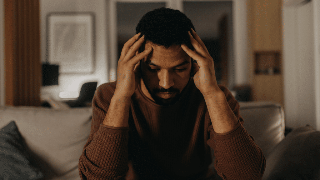 A man looking stressed home