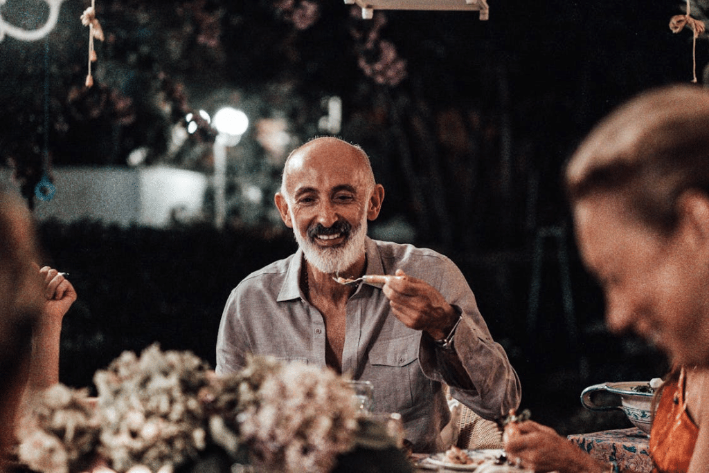 A Bearded Man Eating