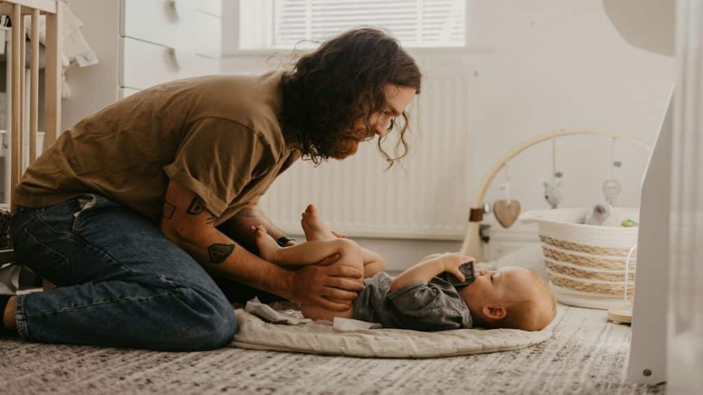 A dad taking care of his baby