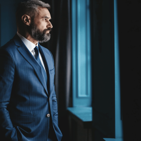 A man looking out the window