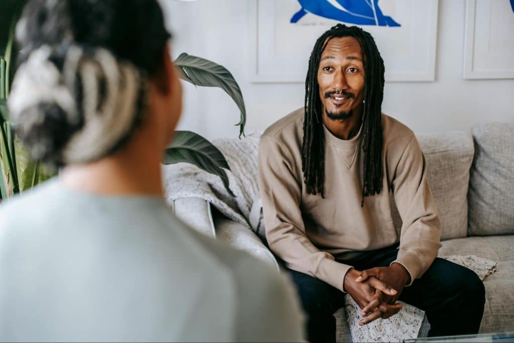 A man telling a story to a woman