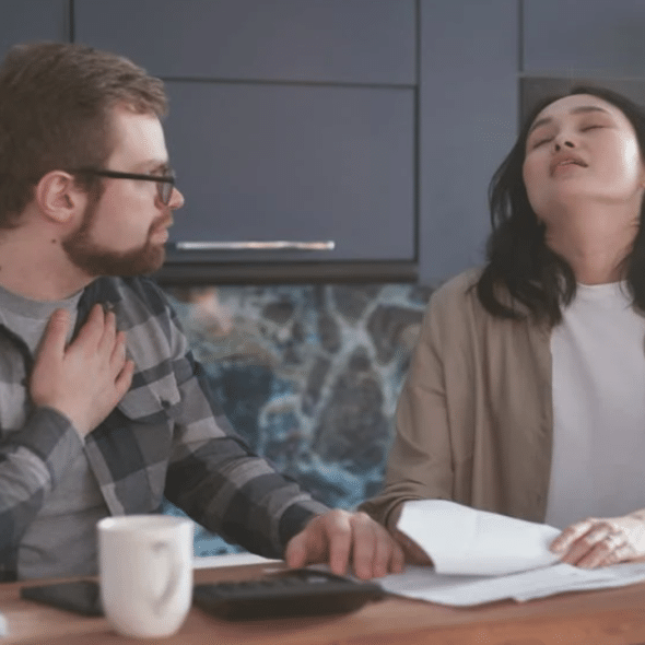 A couple fighting over the bills