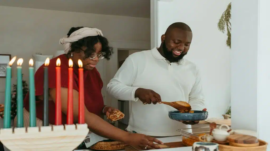 A Man and a woman preparing meal in the kitchen.