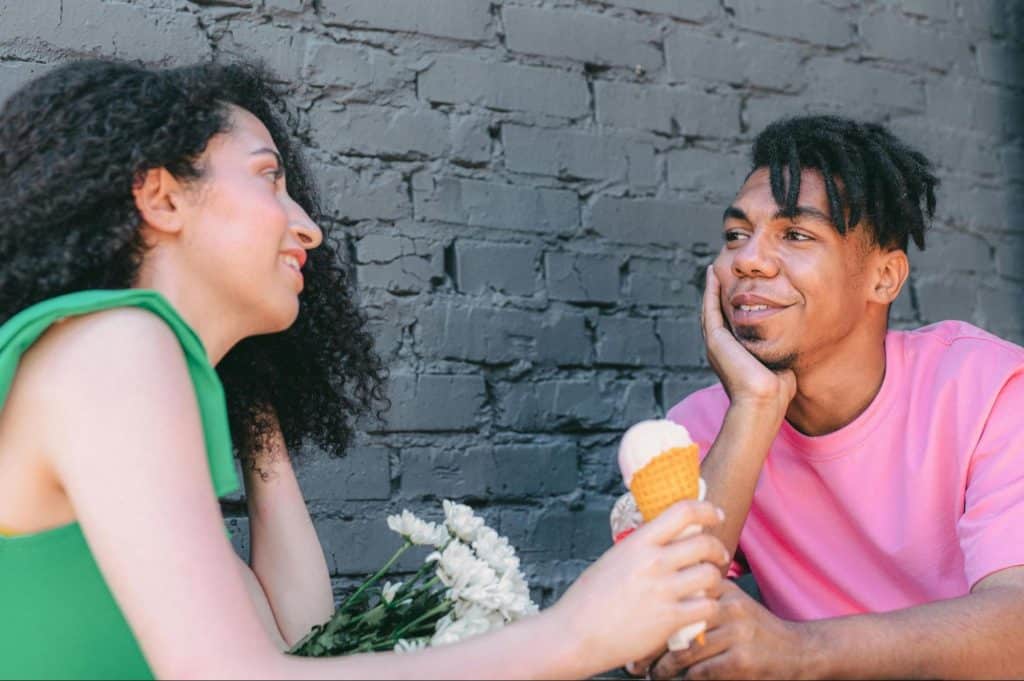 A man and woman having an ice cream date
