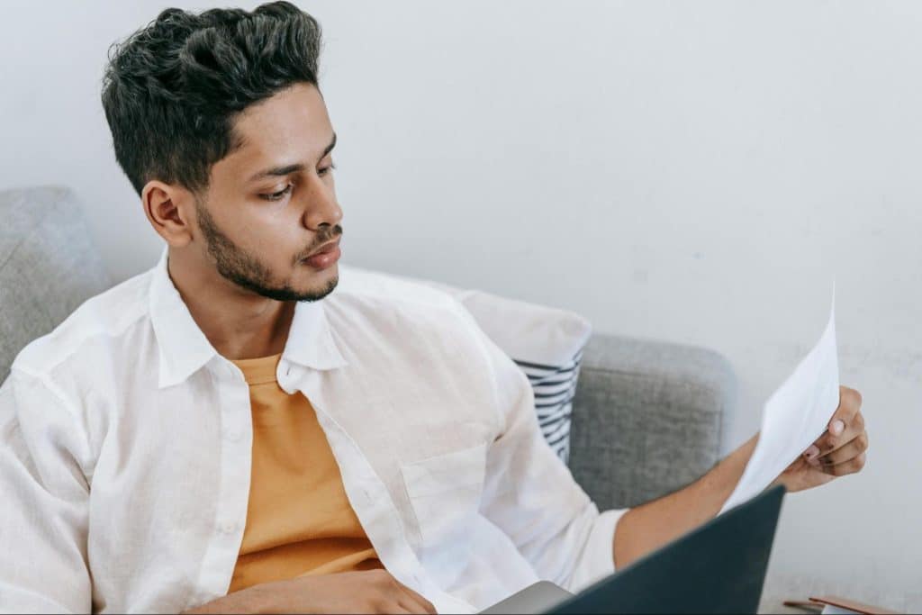 A man reading a document 