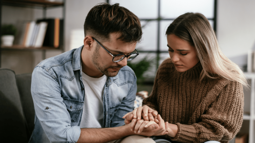 A couple praying together