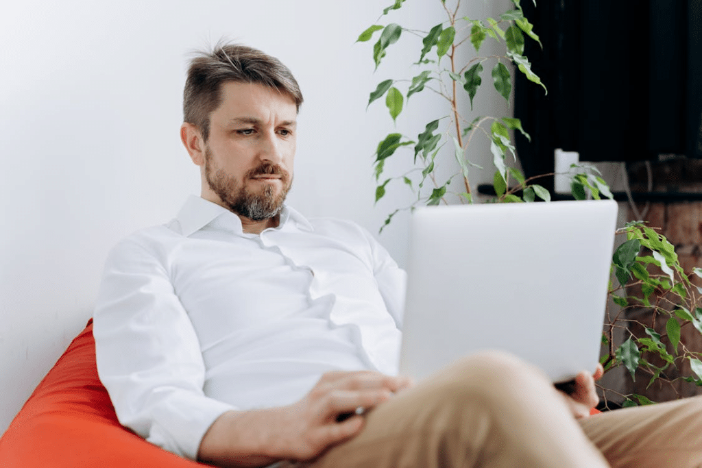 Stressed Man Touching His Face
